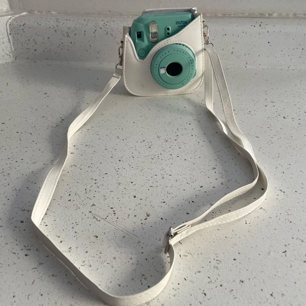 Instax camera with holder
